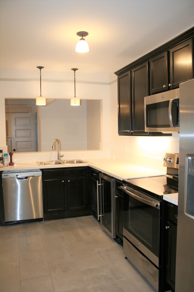 New kitchen even has a wine refrigerator - 1415 Center St