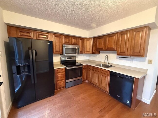 Foto del edificio - 13325 Hiddendale Ln