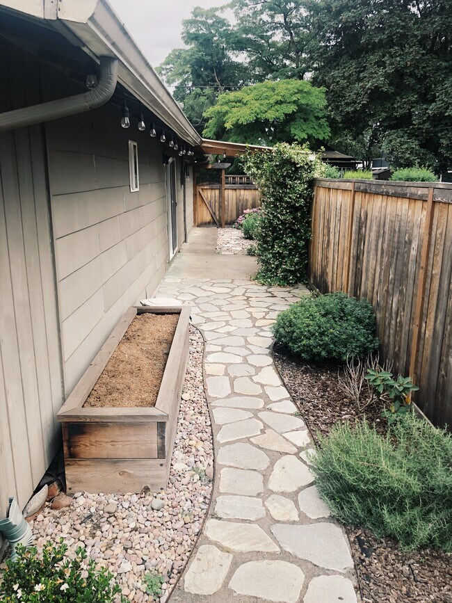 Garden box and landscaped patio - 8505 N Drummond Ave.