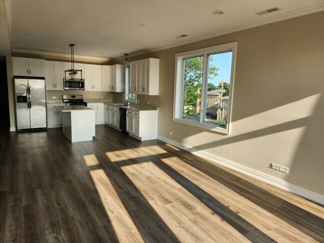 Cocina/Sala de estar - Large 2 Bedroom Apartment with Heated Garage