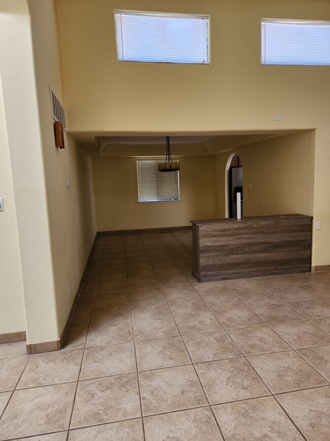living room to dining room - 9517 San Rafael Ave NE