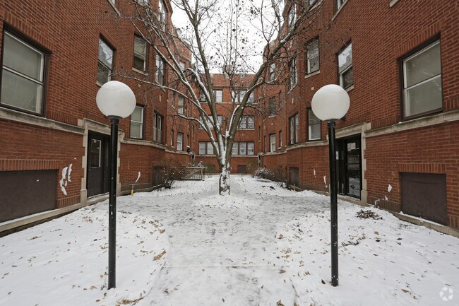 7237 - 7239 S Bennett Ave - 7237-7243 S Bennett Ave