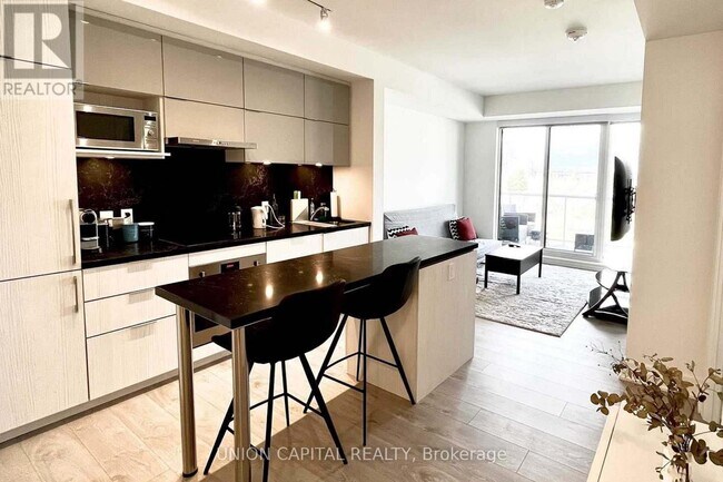 Photo du bâtiment - 18 Rouge Valley Dr W