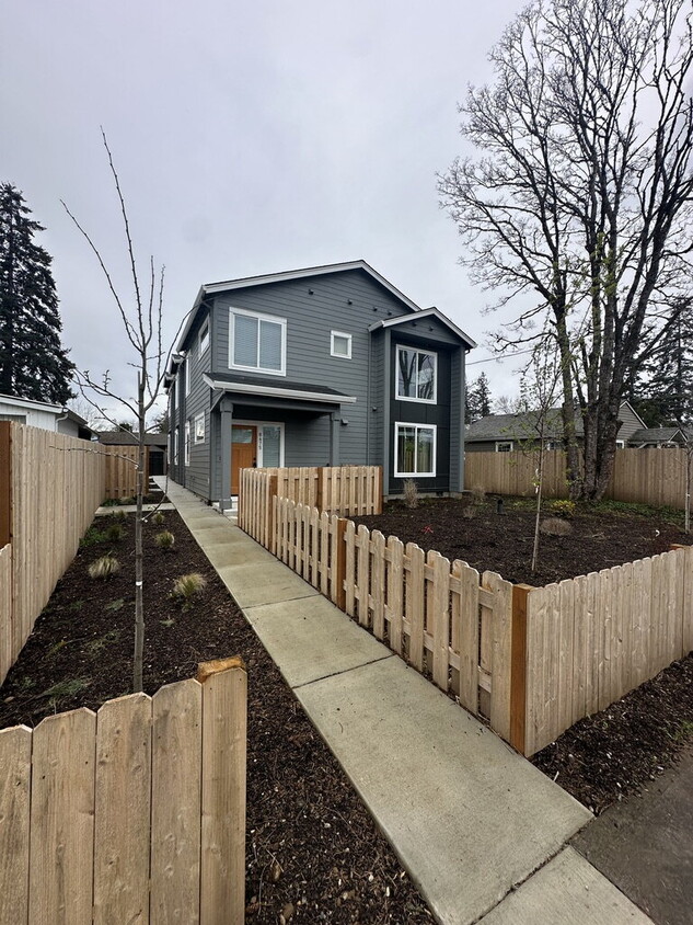 Primary Photo - New 2-Bedroom Townhome with Large Front Ya...