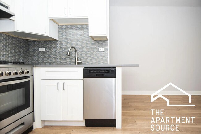 Building Photo - 511 W Belmont Ave