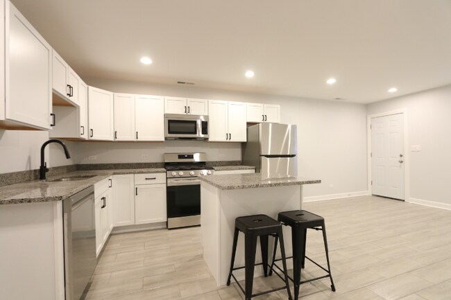 Foto del edificio - 828 S Oakley Blvd