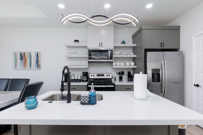 Building Photo - FOR LEASE - MODERN COMFORT MEETS PRIME LOC...