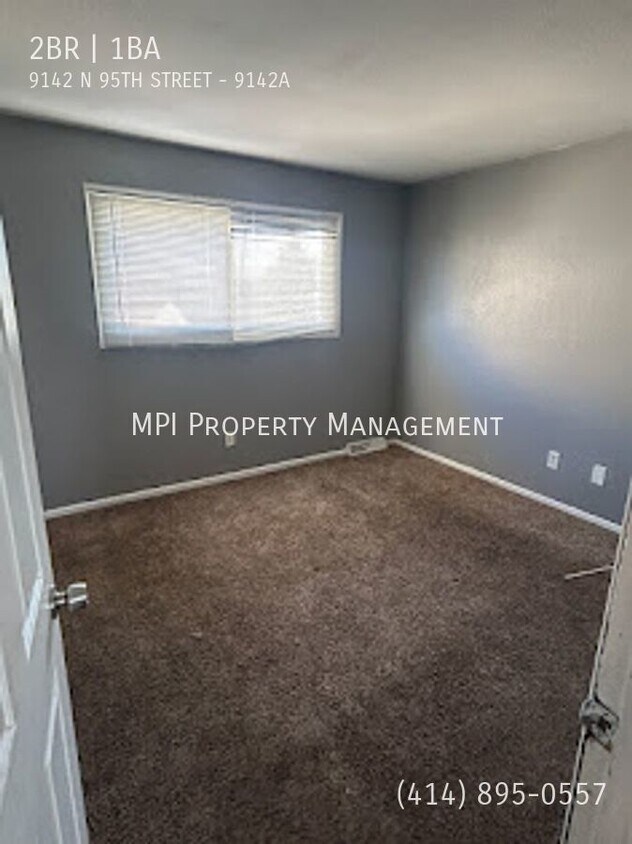 Building Photo - 9142A N. 95th STREET - 2 Bedroom Upper.