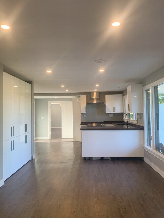 View of kitchen from living room - 815 108th Ave SE