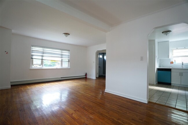 Building Photo - 203-12 42nd Ave