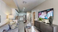 Located at 3675 T St in Sacramento's desirable Curtis Park neighborhood, this one-bedroom, one-bathroom unit offers a well-designed open-concept layout with modern finishes throughout. Light wood-tone flooring runs through the main living areas, complementing the neutral warm-gray palette that creates a cohesive, contemporary feel.

The kitchen is a standout feature, showcasing crisp white shaker cabinetry, gray quartz countertops, a hexagonal tile backsplash, and a full suite of stainless steel appliances including a refrigerator, electric range, microwave, and dishwasher. The open layout connects the kitchen seamlessly to the living room, which benefits from natural light through windows and access to a private balcony.

The bedroom is carpeted for comfort, features tray ceiling detailing, a large window with natural light, and direct access to a dedicated closet with built-in shelving. The full bathroom includes a soaking tub with shower, a single-sink vanity with gray quartz countertops, a large mirror, and open wall shelving for additional storage. A small nook near the bathroom provides a functional space for a desk or additional storage. The unit offers an efficient, thoughtfully organized floor plan suited to comfortable everyday living.