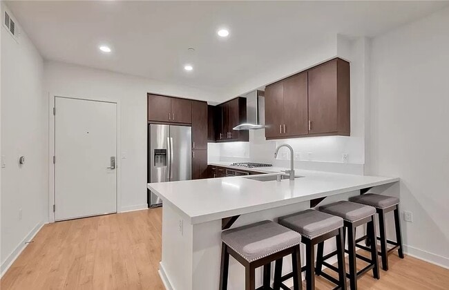 Building Photo - Comfortable Spaces You’ll Love Coming Home To