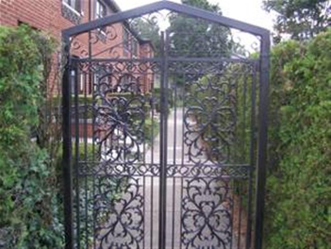 Front gates to Property - 6350 N College Ave