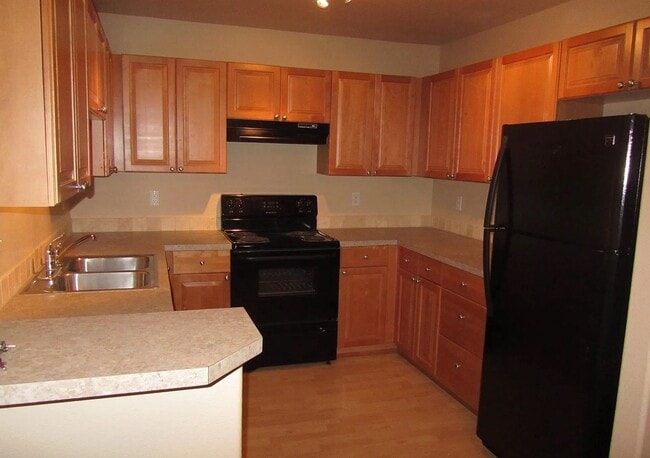 Building Photo - Beautiful Second-Floor Condo in Promenade Post Falls