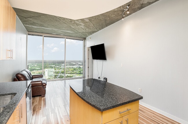 Floor to Ceiling Windows - 210 N Church St Apartment