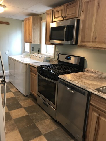 Kitchen w/ W/D / door to back yard - 179 Union St