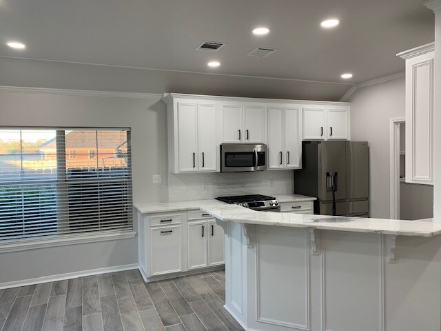 Foto del edificio - 6113 Hollyhock Ln