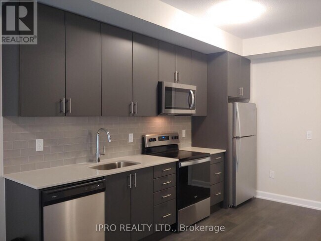Photo du bâtiment - 3200-3200 William Coltson Ave