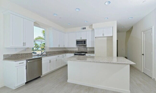 Building Photo - Ultimate Beach House! 3 Bed/3 Bath with Ocean Views from Every Floor, Panoramic Rooftop Deck, Dua...