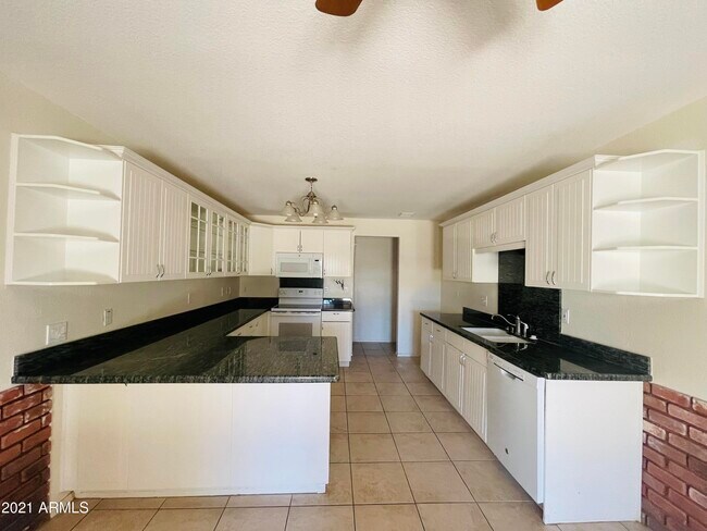 Building Photo - 10642 E Arbor Ave