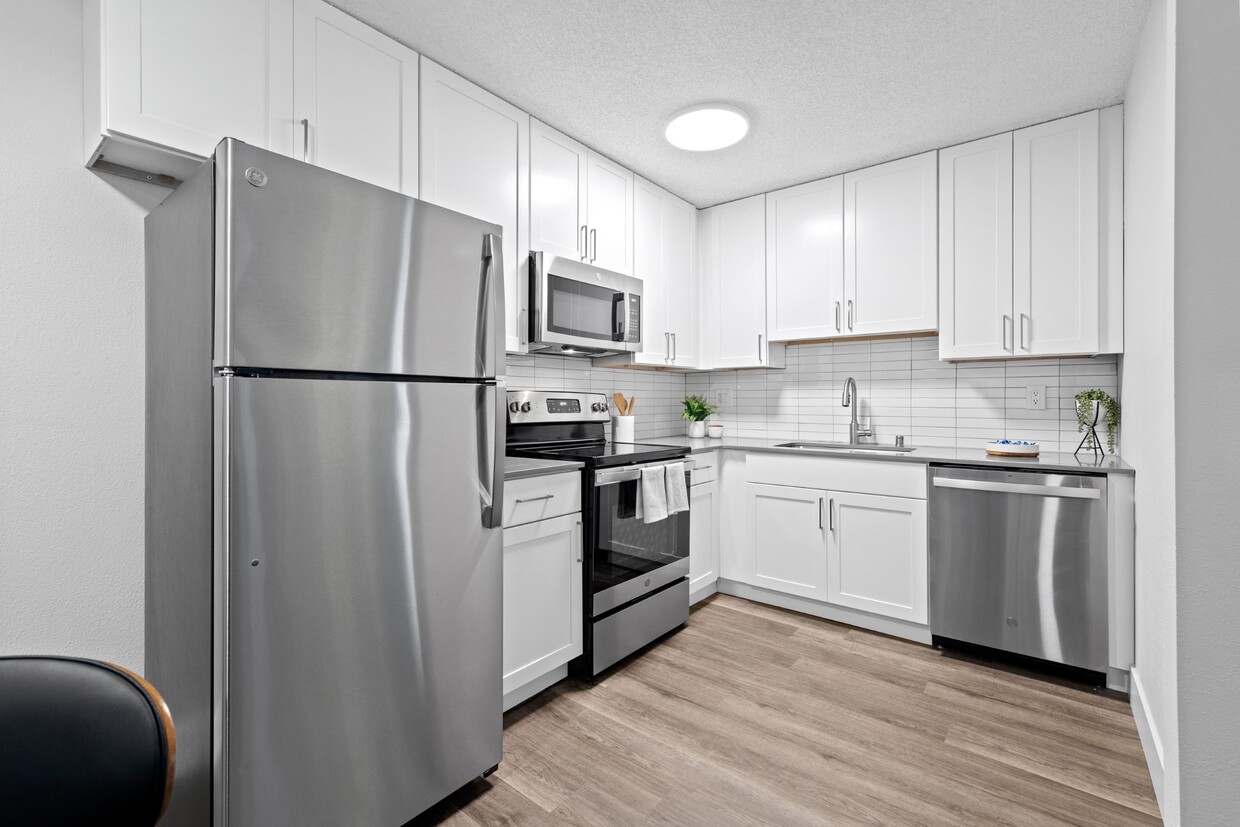 Modern Kitchen with Stainless Steel Appliances at Veranda La Mesa Apartments in La Mesa, CA 91942 - Veranda La Mesa