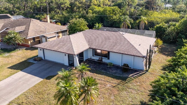 Building Photo - RENT THIS CANAL FRONT POOL HOME WITH ZERO DEPOSIT MOVE IN