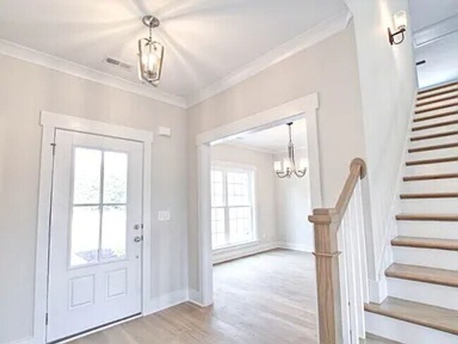 Building Photo - Situated on over 3 acres right in a growin...