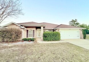 Building Photo - 5659 Tiger Woods Dr