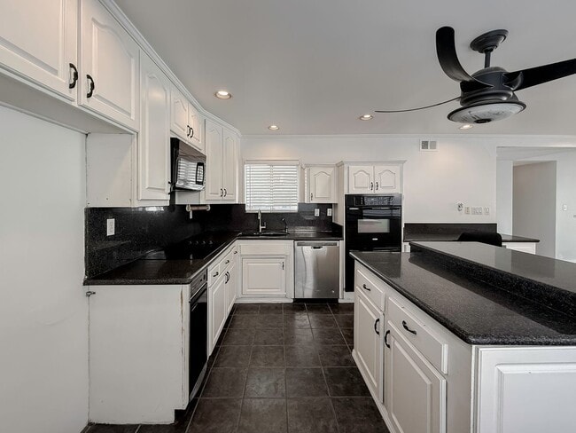 Building Photo - CORNER LOT POOL HOME | JUST REMODELED 4 BEDROOM | FOR RENT IN WEST GARDEN GROVE
