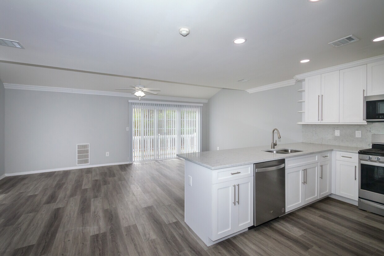 Isla de bar con taburetes y encimera de cuarzo - Fairfield Hills South At Farmingville