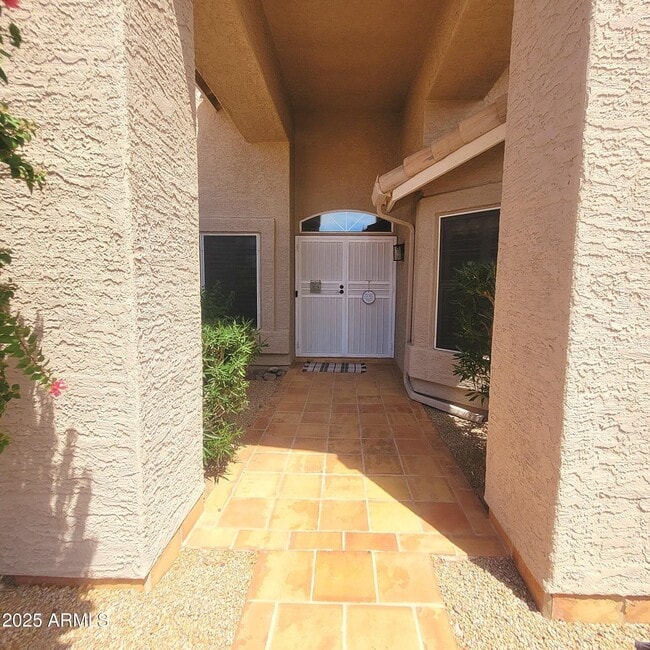 Building Photo - 9482 E Palm Tree Dr