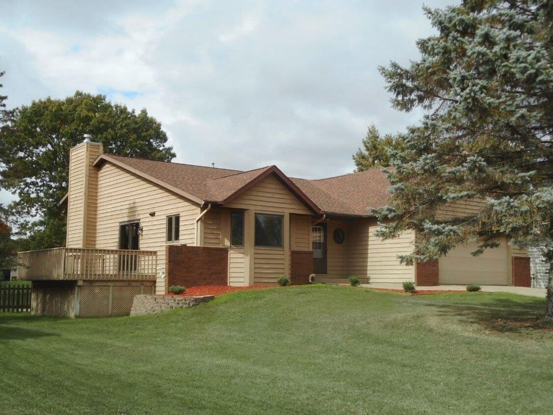 Primary Photo - Spacious 4-Bedroom Home with Fireplace and...