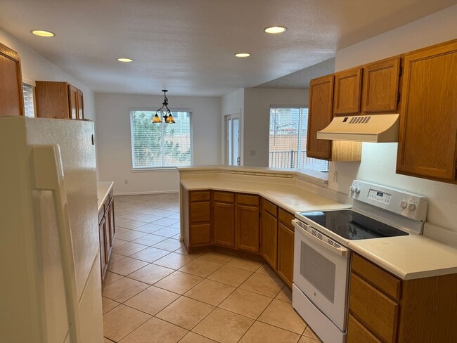 Building Photo - Spacious 4-Bedroom Ranch with Finished Bas...