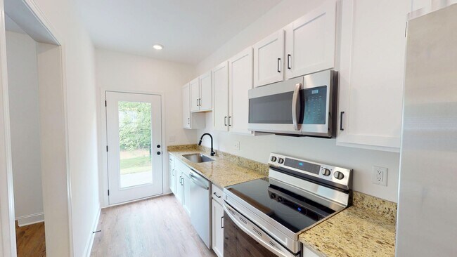 Foto del edificio - Two Bedroom Townhomes With Flex Room at Th...
