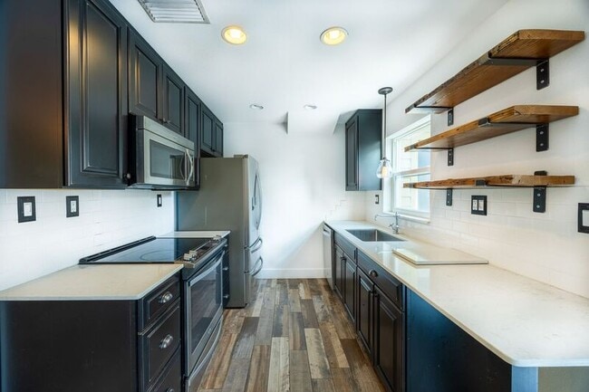 Foto del edificio - 3104 Harrison Ave
