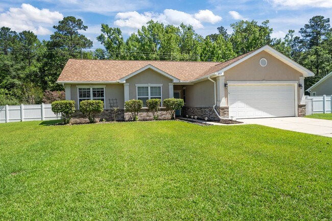 Building Photo - Park West Beauty! 3-Bedroom Home with Screened Porch and Fenced Backyard