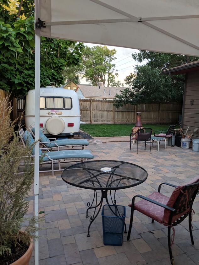 Enjoyable back patio seating to be shared by all. - 229 E Ottley Ave