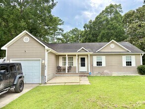 Building Photo - 7017 Woodleaf Pl