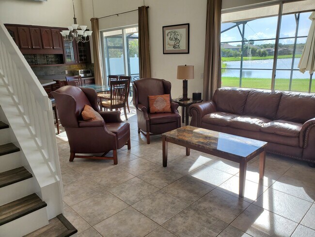 with furniture, it is now unfurnished - 5368 Dahlia Reserve Dr