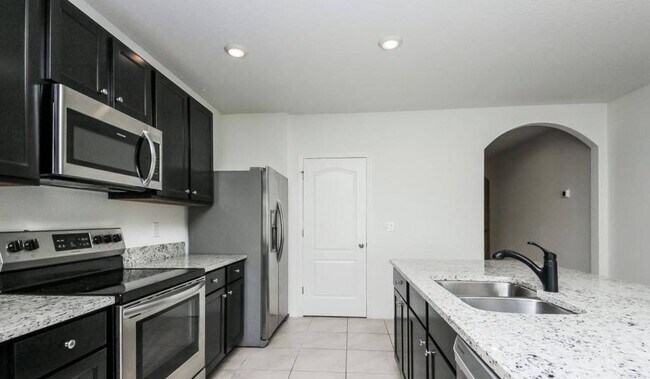 Building Photo - 5117 Fiddlewood Way