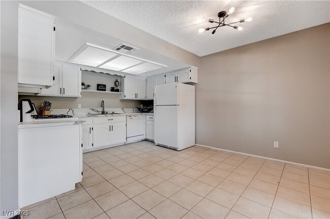 Building Photo - 6657 W Tropicana Ave