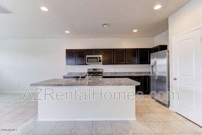Building Photo - 37748 W Bello Ln