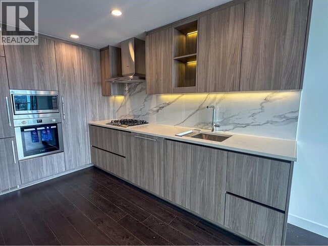 Building Photo - 4890 Lougheed Hwy.