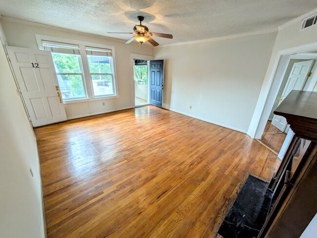 Living area with access to private balcony - 801 E North St