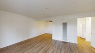 Located at 2807 Yulupa Ave in Santa Rosa, CA, this well-designed one-bedroom, one-bathroom unit offers a functional and comfortable single-floor layout. The living and dining areas are finished with warm wood-look flooring and bright white walls, creating a clean, open atmosphere. A ceiling fan overhead and a wall-mounted HVAC unit provide year-round climate control. A sliding glass door floods the living area with natural light and opens directly to a private outdoor patio enclosed by a wood fence.

The kitchen features a pass-through granite-style countertop with a stainless steel sink, white cabinetry, and includes a range and refrigerator. Pendant lighting and a ceiling fan add a practical, modern touch to the space.

The bedroom is carpeted for comfort and includes a sliding glass door for additional natural light and outdoor access. Generous storage is provided through multiple closets, including a shelved unit ideal for organization.

The bathroom is finished with wood-look flooring, a combined shower and tub, a granite-topped vanity, and a grab bar for added accessibility. Three closets throughout the unit offer ample storage solutions, rounding out this efficiently designed home.
