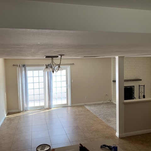 View of Slider and fire place from Kitchen - 1507 Prospect Ave