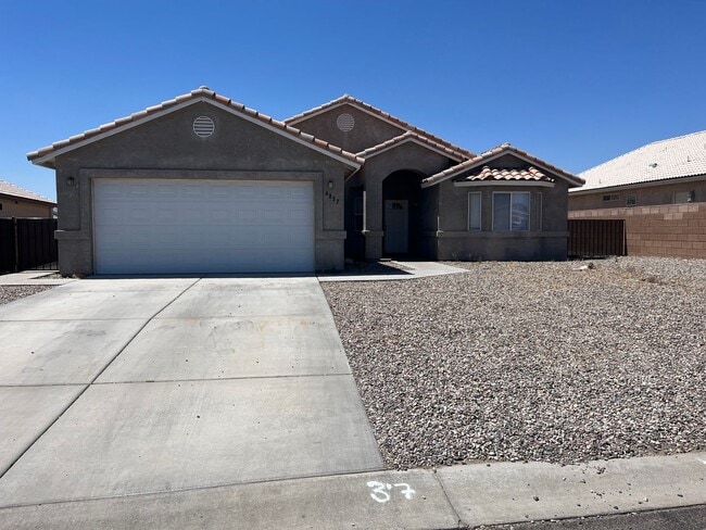 Building Photo - Three bedroom with garage and yard