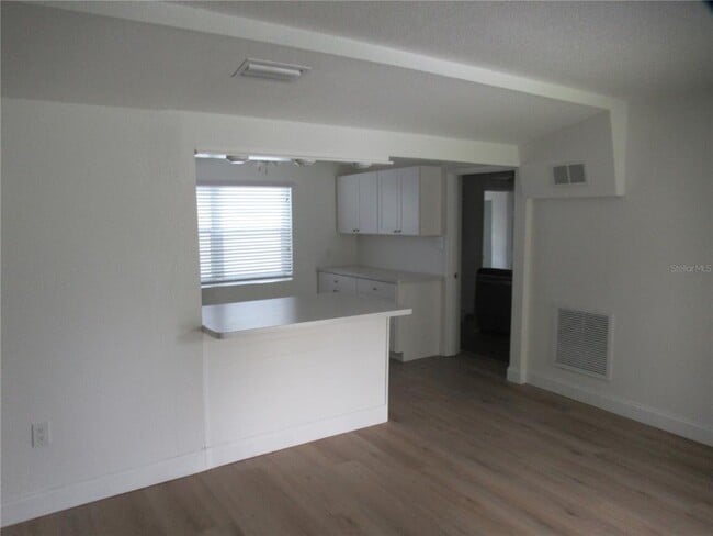 Building Photo - 7374 Royal Palm Dr