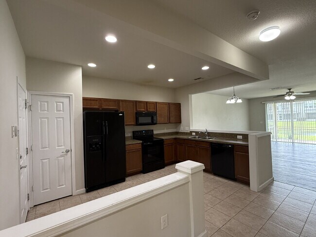 Building Photo - "Stunning Water View Townhouse for Rent in...