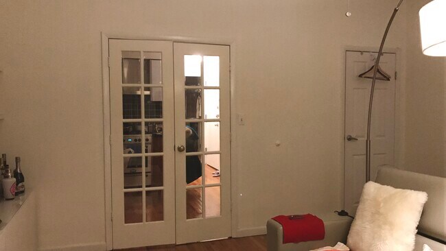 French door enclosed living room - 91 Garden St